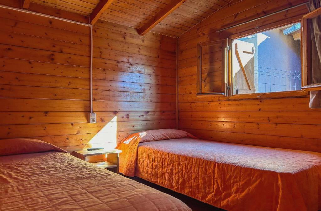 Disfruta de tu bungalow en Tamarit con acceso al spa incluido